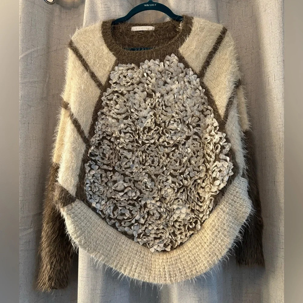 Egoist‎ Sweater Multi-material with Pedal like design, stripes and mohair look.